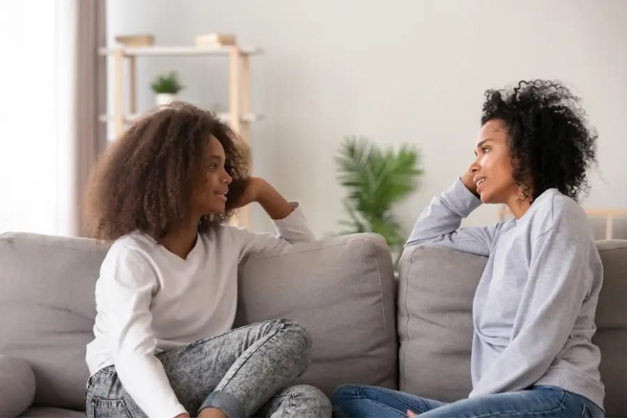 Mother and daughter talking